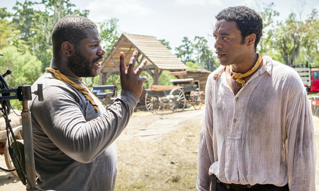 Steve McQueen directs Chiwetel Ejiofor on the set of 12 Years a Slave.