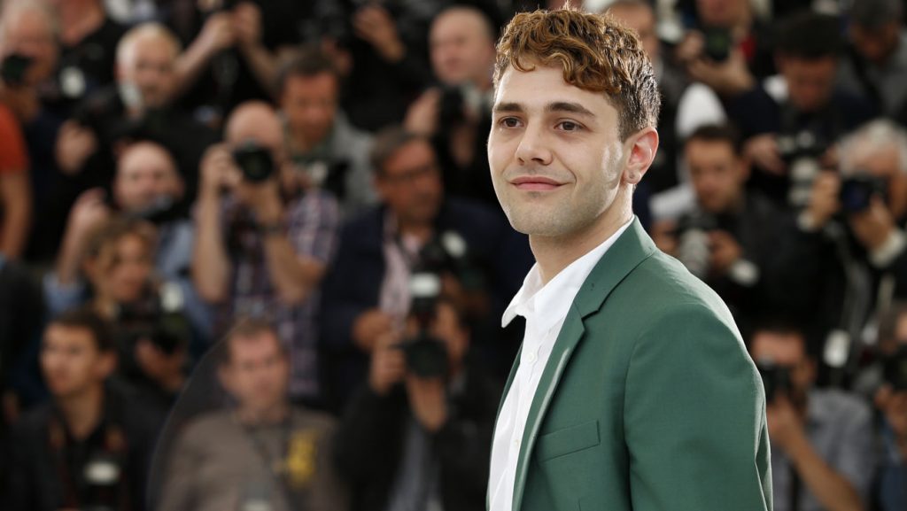 Director Xavier Dolan poses during a photo call for Mommy at the 67th international film festival, Cannes, southern France, Thursday, May 22, 2014. (AP Photo/Alastair Grant)